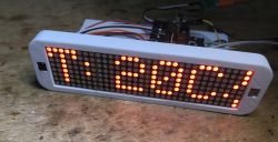 DIY Clock with WiFi Module and LED Display LED display with WiFi module showing temperature 28°C.