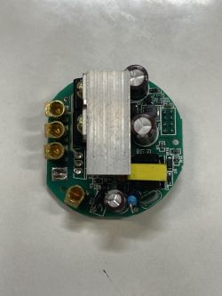 Close-up of the interior of an electrical switch with various components, including a ZTE module.