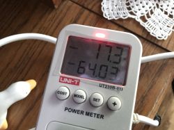 UNI-T UT230B-EU power meter shows 17.3 W usage and cost of 64.03.