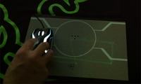 Razer Tron myszka która zostawia ślad na trackpadzie