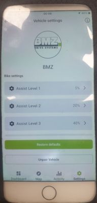 Zdjęcie ekranu telefonu z aplikacją BMZ do ustawień pojazdu elektrycznego, pokazującą poziomy asysty roweru.