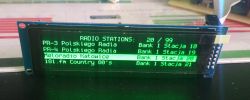 LCD screen displaying a list of radio stations.