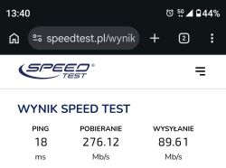 Zrzut ekranu z speedtest.pl z wynikami: ping 18 ms, pobieranie 276,12 Mb/s, wysyłanie 89,61 Mb/s.