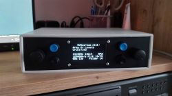 DIY radio player with a display on a desk.