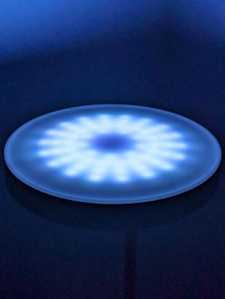 Modern Floor Lamp with Light Disc Modern floor lamp with a glowing blue light disc.