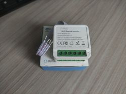 MINI-W1-3CH WiFi Switch Module MINI-W1-3CH WiFi switch module on a box with wiring