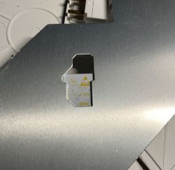 Metal Plate with Technical Marking Metal plate with a cutout for a technical marking.