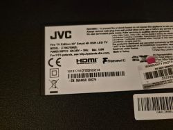 JVC LT-50CF890(B) TV label with model and power information.