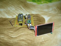 Prototype board with ESP32 module and connected TFT display