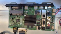TV motherboard with various ports and connectors.