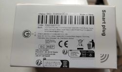 Label of Tuya smart plug packaging with SKU, barcode, and manufacturer information.