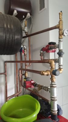 What Causes Sediment Deposits on Copper Pipes in a Central Heating System?