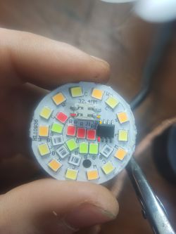Close-up of a PCB with highlighted SDA and SCL pins and LEDs.