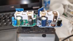 Two blue Aubess smart socket PCBs.