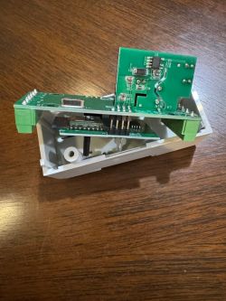Two-phase energy meter with open casing Two-phase energy meter with visible two PCB layers.