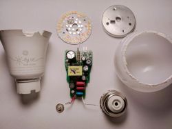 Disassembly of GE Smart Bulb Disassembled GE smart bulb showing internal components.