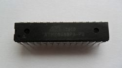 Photo of ATmega88PA-PU microcontroller in DIP28 package with fake markings.