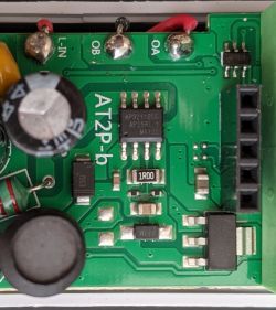 Close-up of the Interior of an AliExpress Energy Meter Close-up of a circuit board with visible chips and markings.