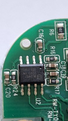 Close-up of Electronic Circuit Board with Chip Close-up of an electronic circuit board with various components, including a small chip.
