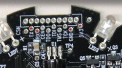 Printed circuit board with labeled test points and components.