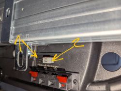 Electrical panel with marked connectors in a device Close-up of an electrical panel with two marked connectors.