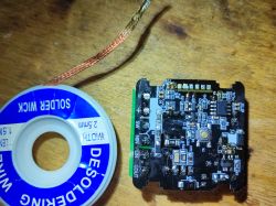 FS-05R dimmer circuit board next to solder wick