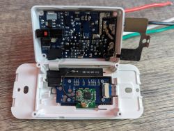 Interior of a Shelly Plus wall dimmer showing the electronics.