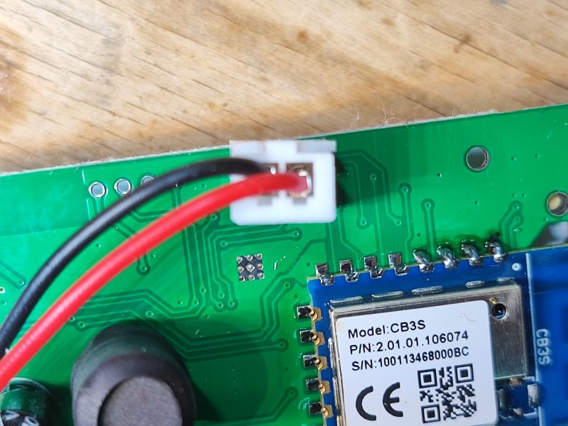 CB3S Module on Circuit Board with Wires Close-up of a CB3S module on a circuit board with black and red wires.