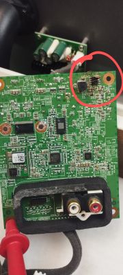 Close-up of a PCB with a marked area indicating a fault.