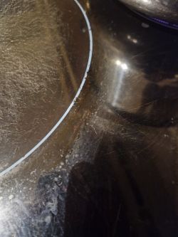 Electrolux EHH6340FXK induction hob blisters under one of the burners