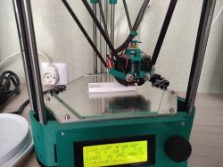 Delta 3D Printer Printing an Enclosure Delta 3D printer printing a plastic enclosure.
