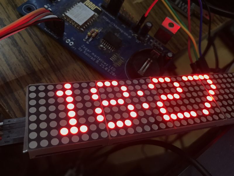 LED display showing time 18:27 connected to an electronic control board
