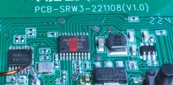 PCB with Nuvoton Microcontroller Close-up of a circuit board with a Nuvoton chip and other electronic components.