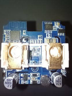 LSPA9 device PCB with visible connectors, electronic components, and electrolytic capacitors, viewed from above.