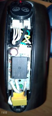 Internal view of a disassembled Hoffek AK3502 kettle showing electronic components.