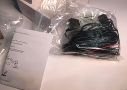 ATLO-GDC2-TUYA Garage Door Controller Set ATLO-GDC2-TUYA garage door controller set with manual and accessories in plastic bags.