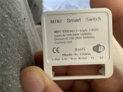 Back of a smart switch with technical information.