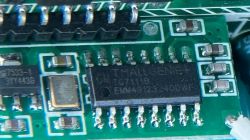 Communication Board with TMALLGENIE TG7111B Chip Close-up of a communication board with a TMALLGENIE TG7111B chip.