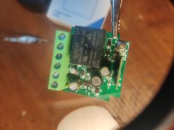 Interior of a DIY smart switch from Aliexpress with visible module and electronic components.