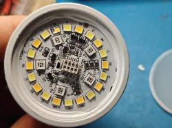 Close-up view of the RGB+C/W smart GU10 bulb PCB with LEDs and SMD components