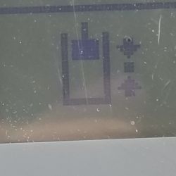 Wyświetlacz z symbolem niskiego poziomu oleju hydraulicznego