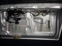 Założenie siłownika centralnego zamka do klapy Astra II