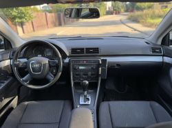 Audi car interior with dashboard and automatic gear shift visible