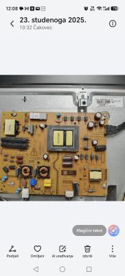 Phone screenshot showing a photo of a power/electronics circuit board inside a metal casing