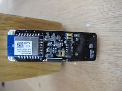 Electronic Module with Identification Label Electronic module with components on a wooden background