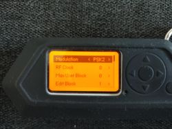 Display of an electronic device showing modulation selection set to PSK2, with options for RF Clock, Max User Block, and Edit Block.