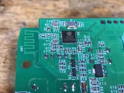 Close-up of PCB with ESP8285 Chip Close-up of a circuit board with an ESP8285 chip and several electronic components.