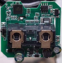 Interior of a Smart Plug Close-up of the interior of a smart plug showing electronic components.