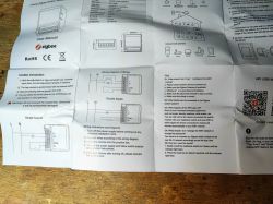 Zigbee Switch Module LZWSM16-1 Manual Zigbee switch module LZWSM16-1 user manual on a table.