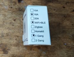 Side of smart switch relay packaging Side of smart switch relay packaging with specification markings.
